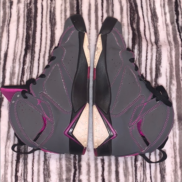 black and pink jordan 7s